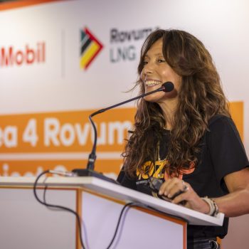 Taci at podium close up - smiling